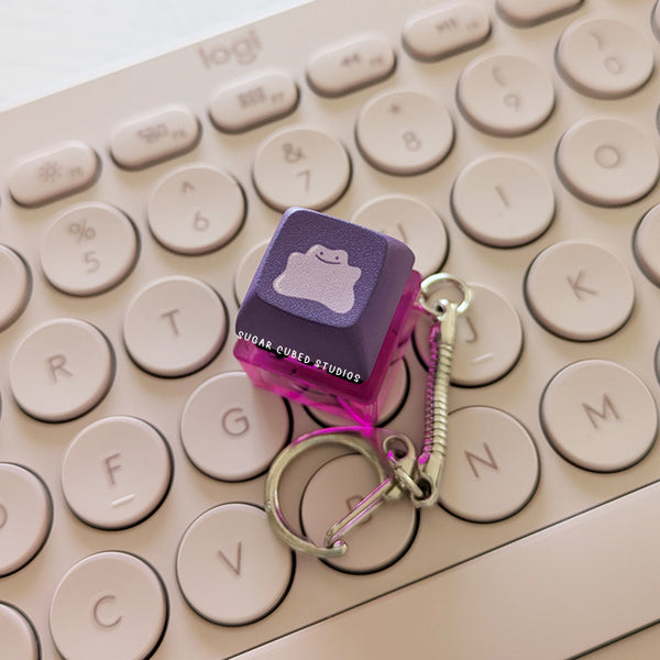 Metamon #132 - Fidget Keycap Keychain